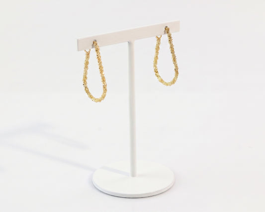 sparkle gold chain errings on a stand