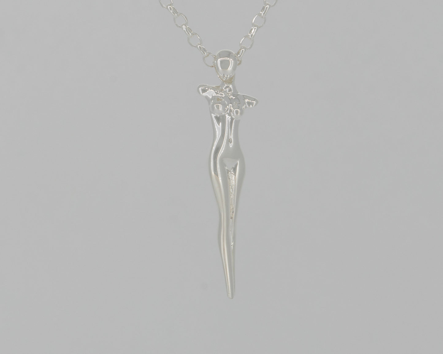 Silver woman's  figure