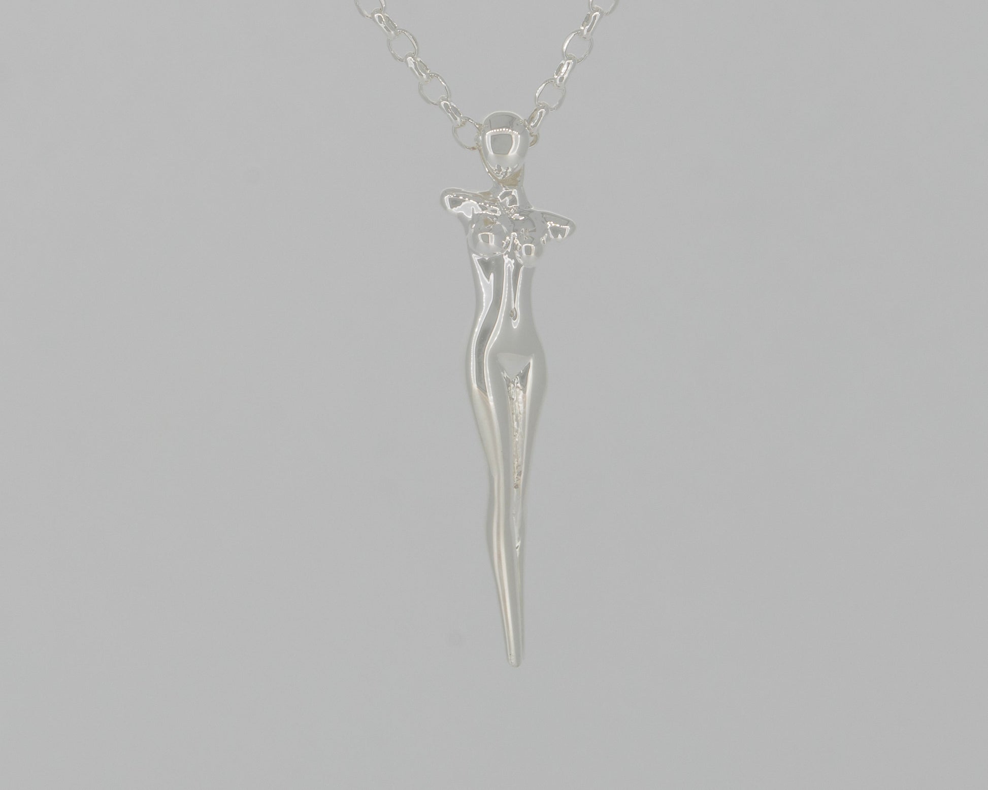 Silver woman's  figure