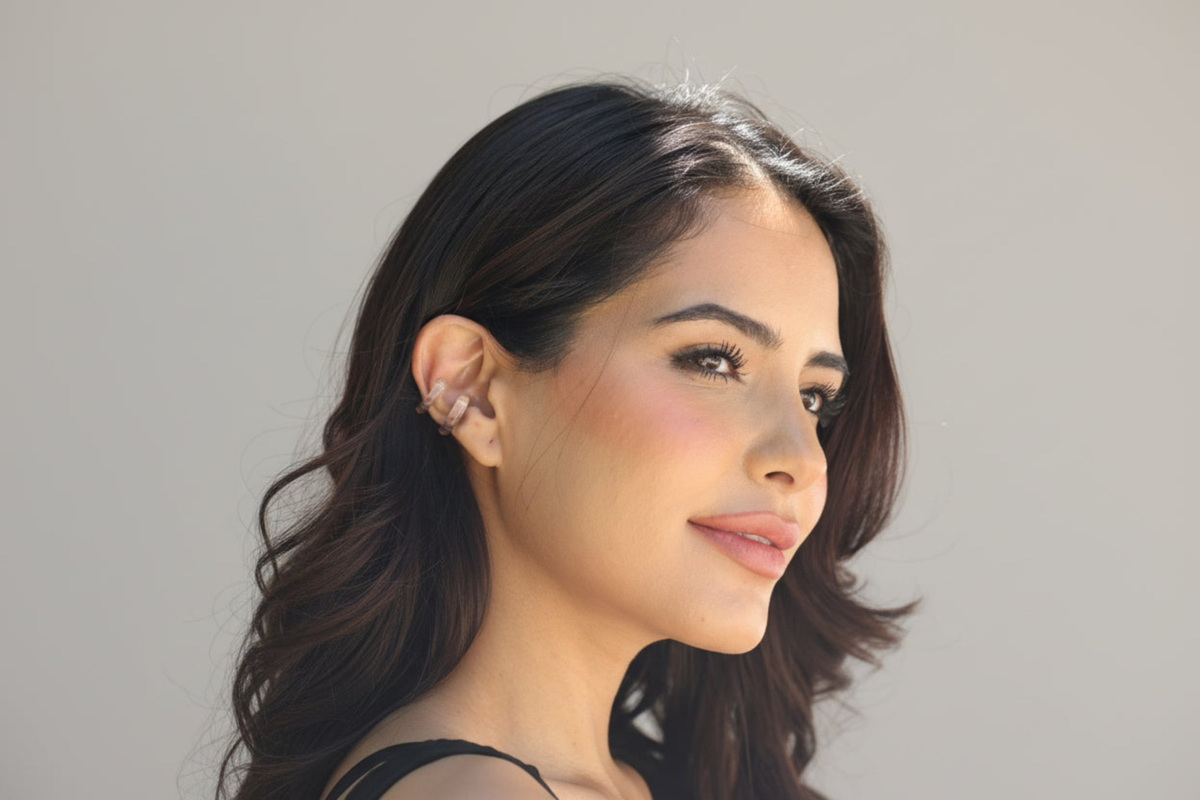  clear q;uartz sar cuff on dark haired female