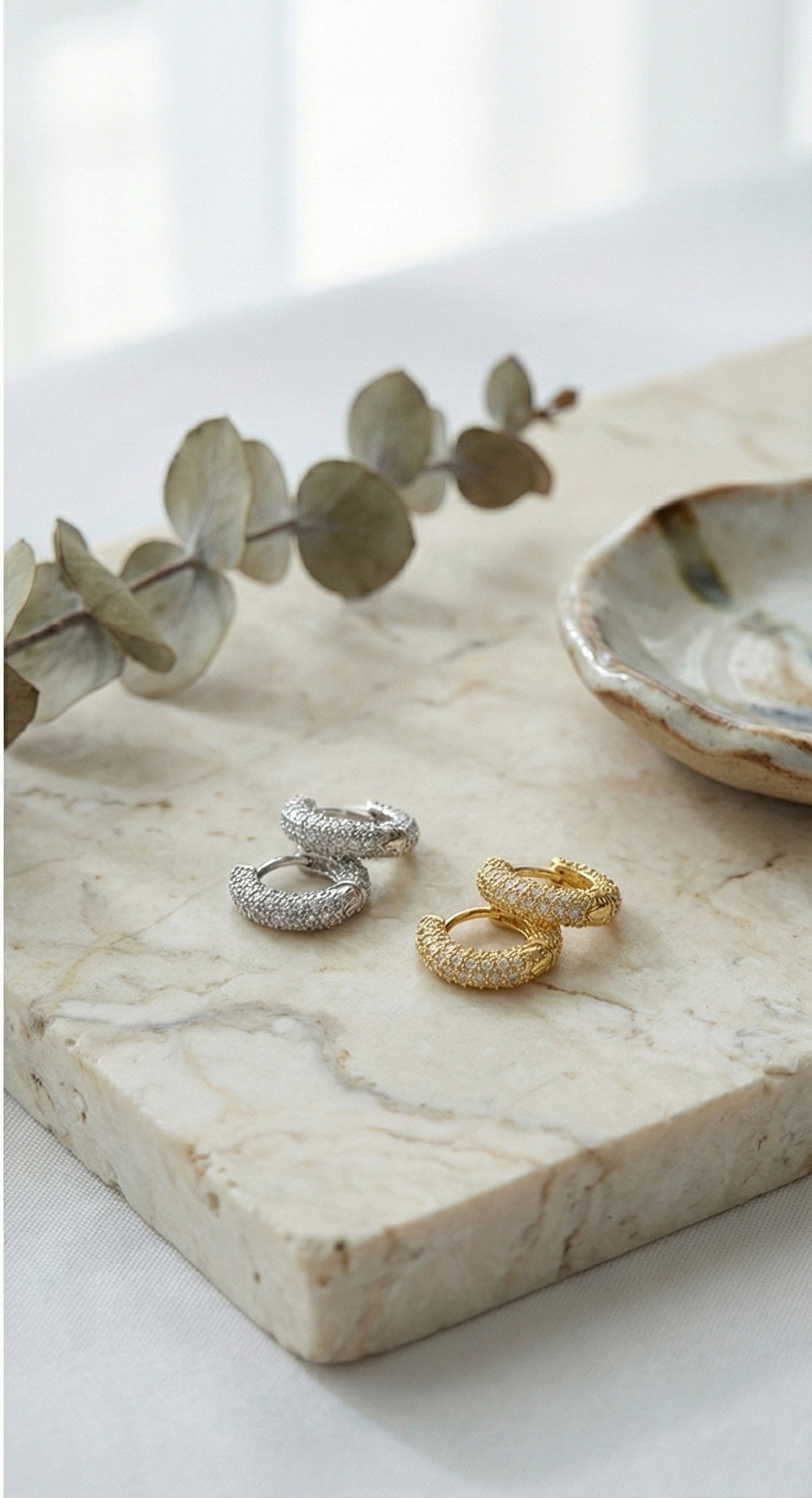 Silver and 
gold pave earrings