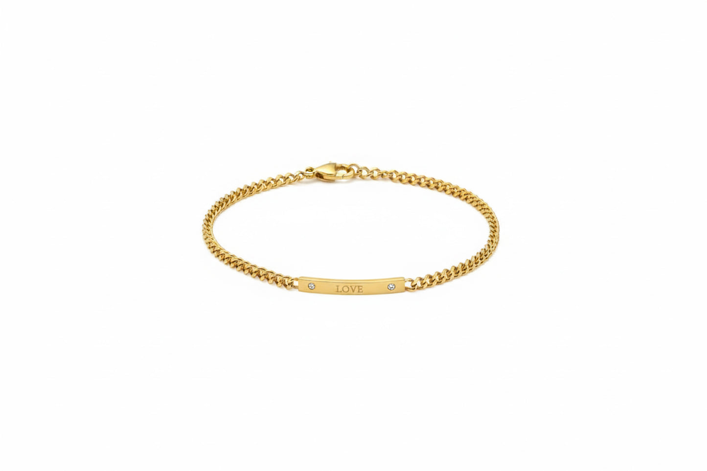Gold bracelet with 'LOVE' engraving on a white background