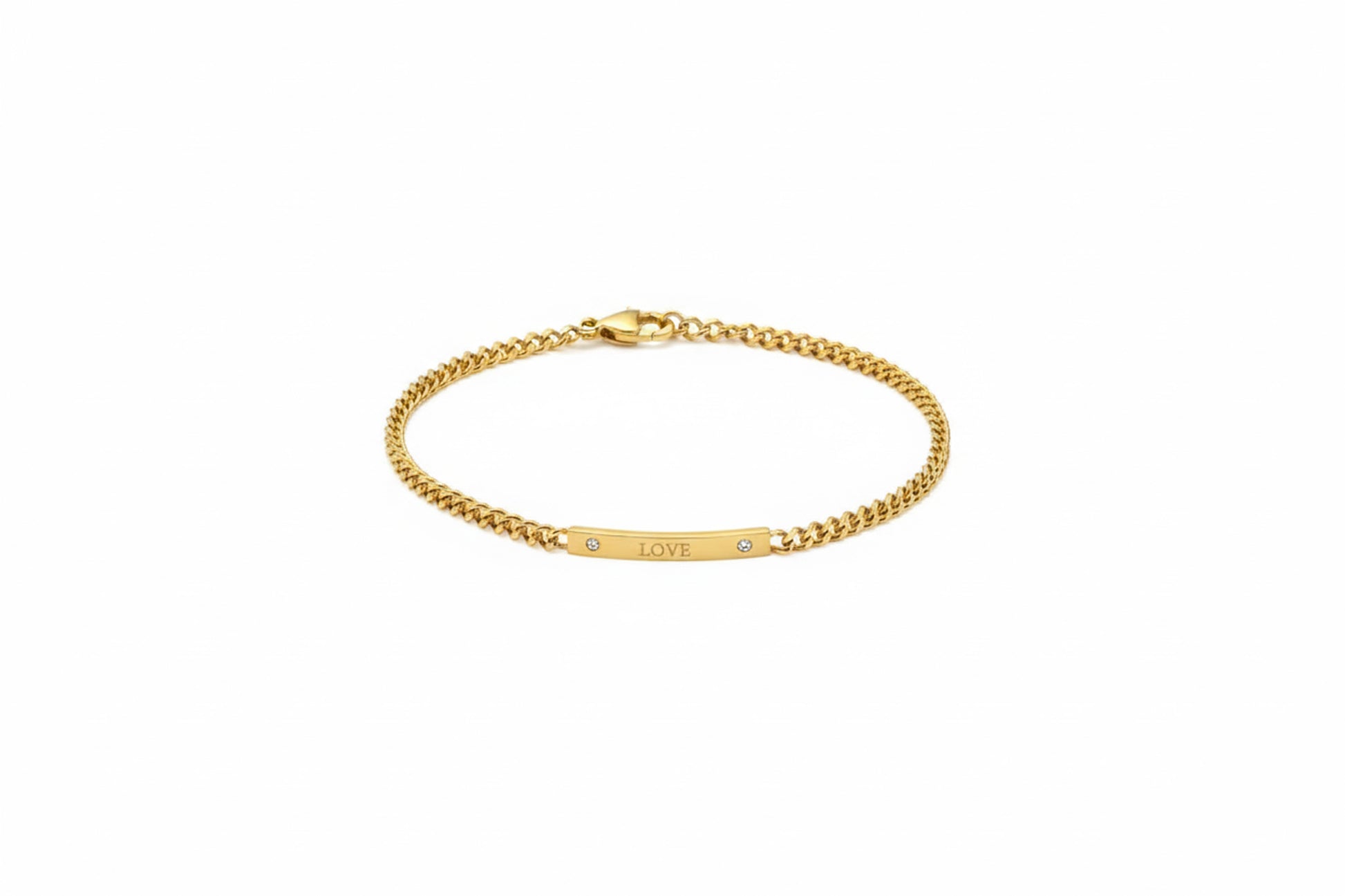 Gold bracelet with 'LOVE' engraving on a white background