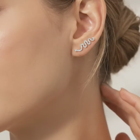 snake earring on a pretty woman