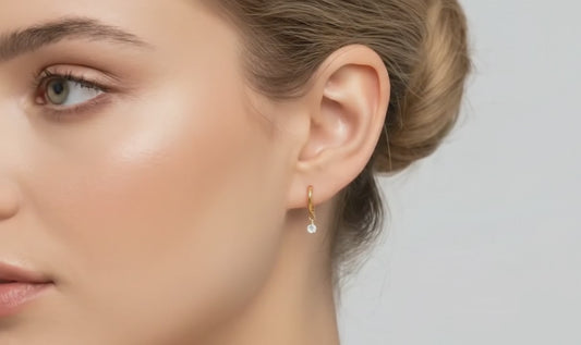 hoop earring with diamond pendent