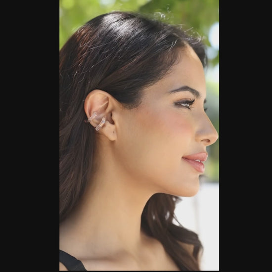 clear quartz ear cuff on dark haired female