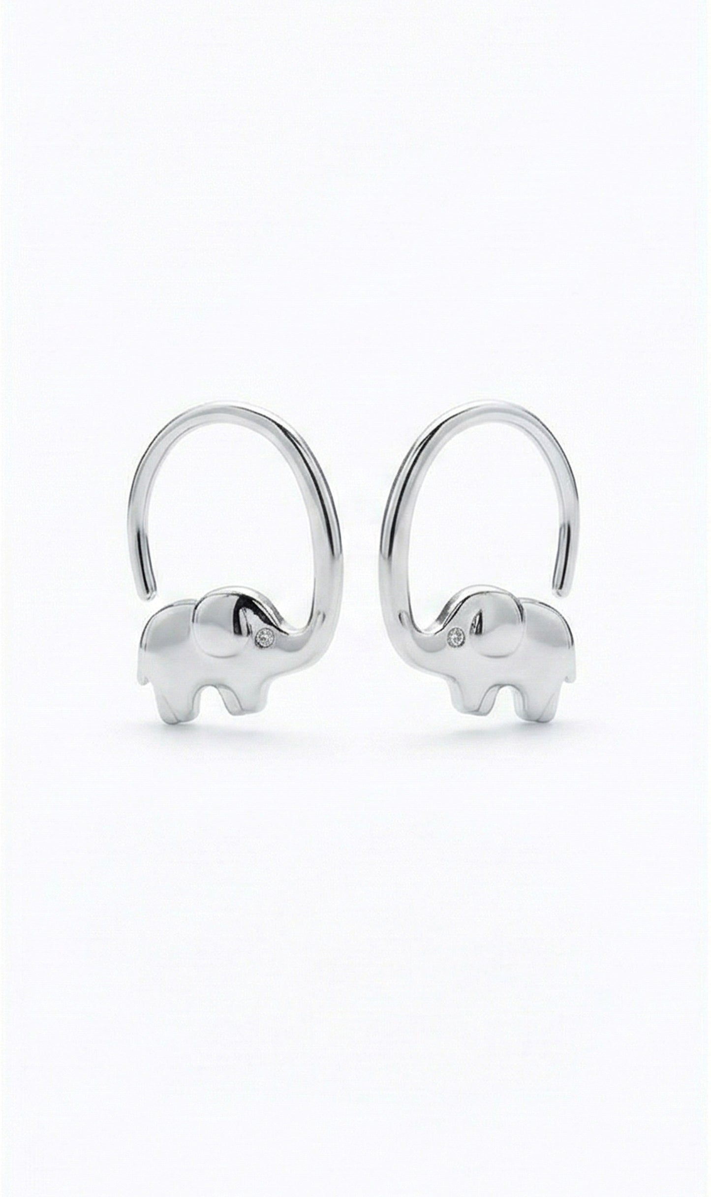 Silver elephant-shaped earrings on a white background