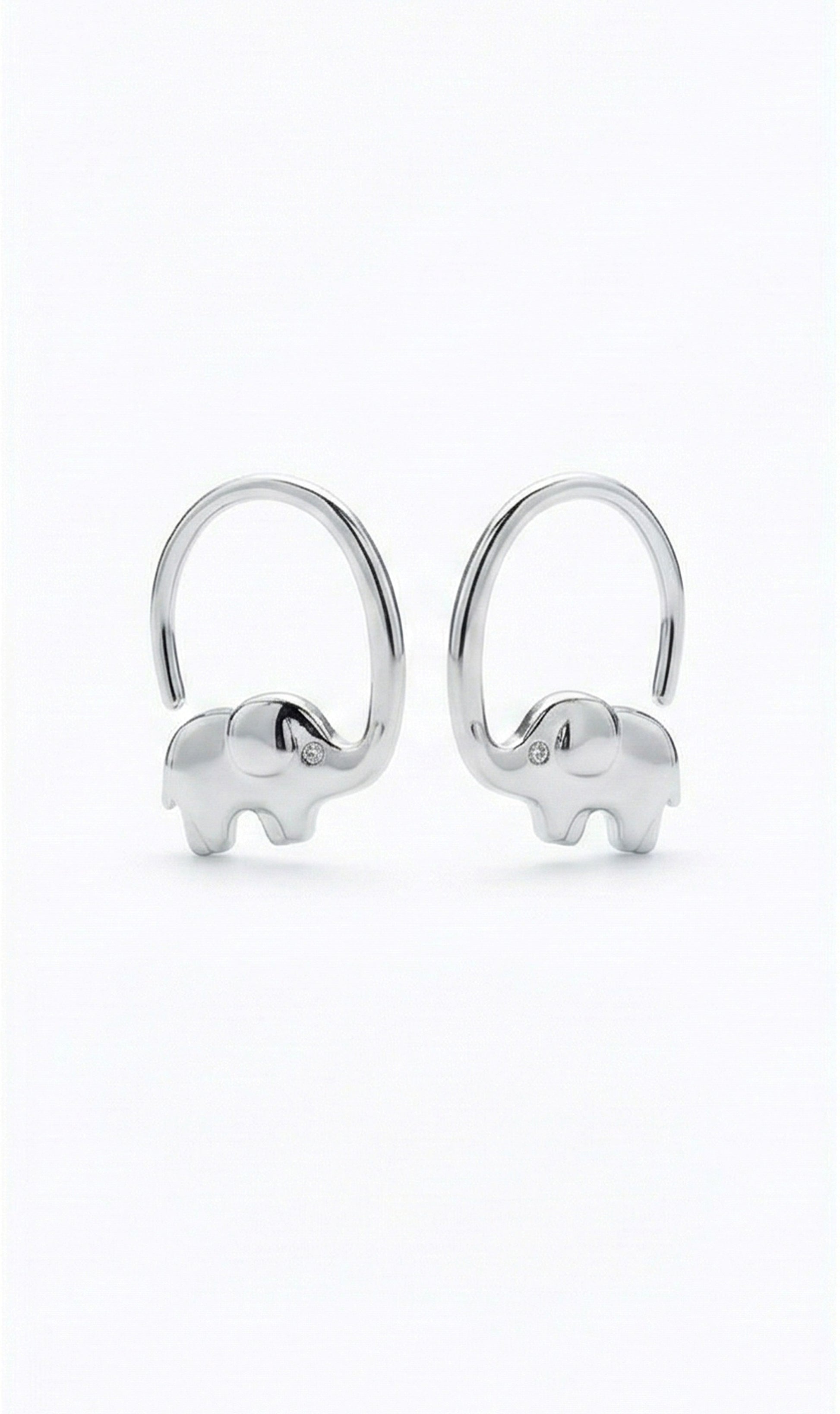 Silver elephant-shaped earrings on a white background
