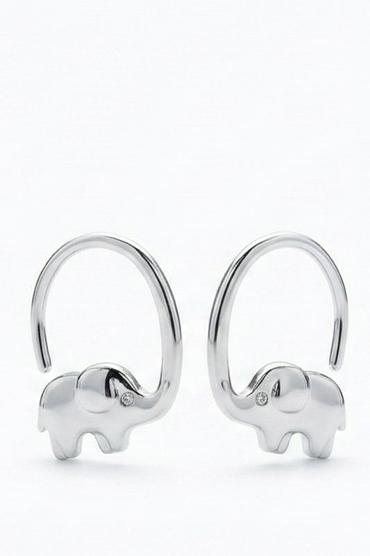 Pair of silver elephant earrings on a white background